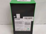 the back of a box with a green label on it