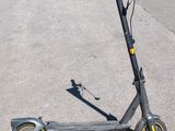a scooter that is sitting on the street