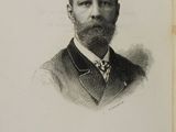a black and white photo of a man in a suit and tie