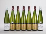 six bouteilles de vin sont alignées dans une rangée