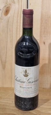 a bottle of wine that is sitting on a table