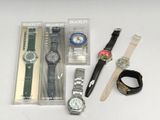 a lot of watches and bracelets on the table