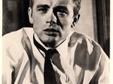 black and white photograph of a man in a shirt and tie