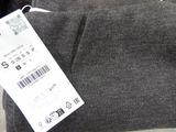 a label on a pair of pants that are on a table
