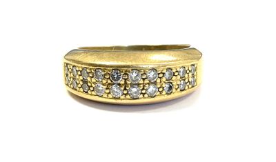 a close up of a gold ring with diamonds on a white background
