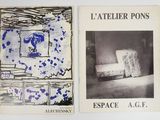 two books on a white table with a picture of a bed and a picture of a chair