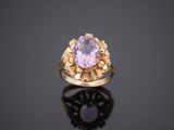 an amethorate and gold ring, set with an oval amethorate