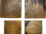 four pieces of wood that have been burned and have been cleaned