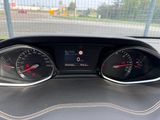 a close up of a car dashboard with gauges and speedometers