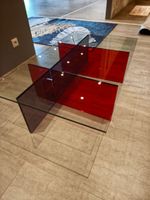 Table basse à plateau transparent et piétement rouge, 120 x … (photo 2)