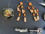 a table with a bunch of jewelry on it