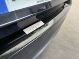 a close up of a car with a sticker on it ' s bumper