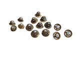 a close up of a bunch of buttons on a white surface