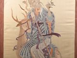 an oriental painting of a man riding a horse with birds flying around