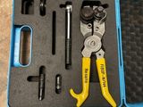 a tool kit in a plastic case on the floor