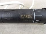 a close up picture of a black object with a qr code on it