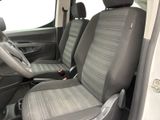 two seats in the back of a car with a steering wheel