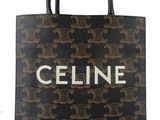 a black and gold tote bag with the name celine on it