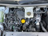 a picture of a car engine with its hood open