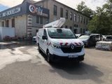 a white van that is parked in front of a building