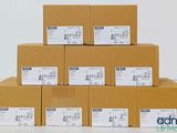 several boxes stacked on top of each other on a table