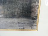 photo encadrée représentant une photo en noir et blanc d'une maison dans les bois