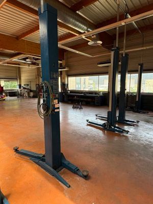 a picture of a garage with a lot of equipment in it