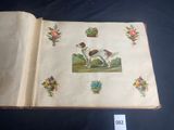 an open book with a picture of a dog and flowers on it