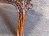 an image of a chair with a green upholstered seat