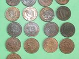 a lot of coins that are on a green surface