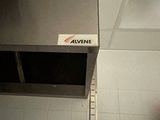 a sign on the wall of a kitchen that says avenue