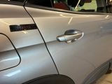 a car that has a sticker on the side of it