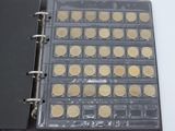 a picture of a binder with a lot of coins in it