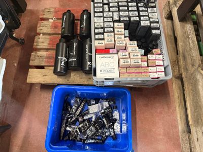 many different types of batteries on a pallet