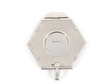 a close up of a silver watch on a white surface