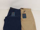 a pair of men ' s pants sitting on top of each other