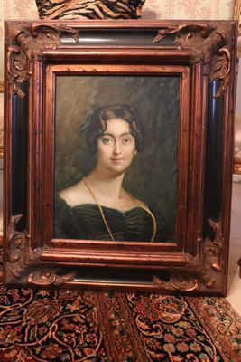 painting of a woman in a black dress sitting on a chair