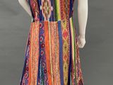 a woman ' s multicolored dress on a mannequin mannequin mannequin mannequin mannequin mannequin mannequin mann