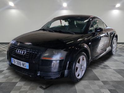 an image of a black audi car parked in a garage