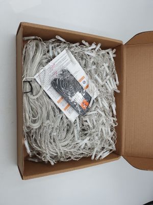 a box with a bunch of shredded paper inside of it