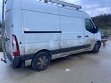 a white van that is parked in a parking lot