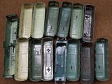 a lot of old cell phones that are sitting on the floor