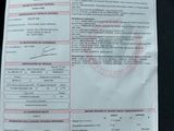 a picture of a vehicle ' s driver ' s license and identification card
