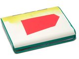 a cake that has a red piece of paper on top of it