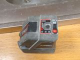 a small camera sitting on top of a wooden counter
