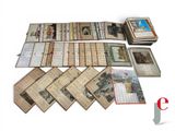 an image of a large collection of old books on a white surface