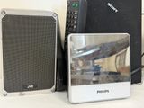 two speakers sitting next to each other on a table