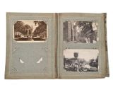 an old photo of a book with pictures of a building and a fountain