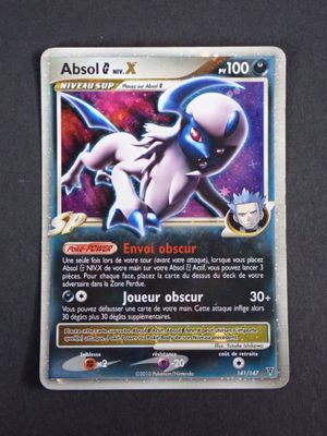 a close up of a pokemon card on a table