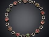 a tourmaline and diamond necklace, by person